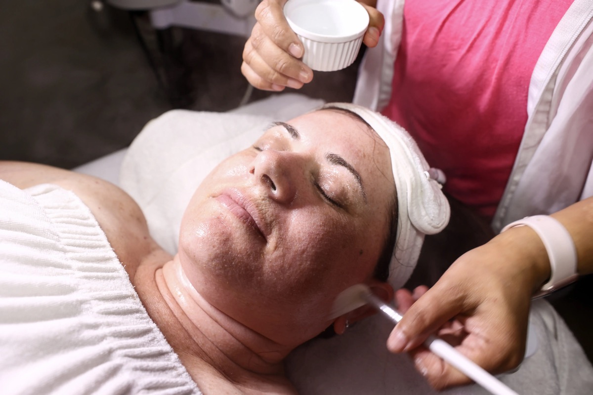 Esthetician applying a customized facial treatment