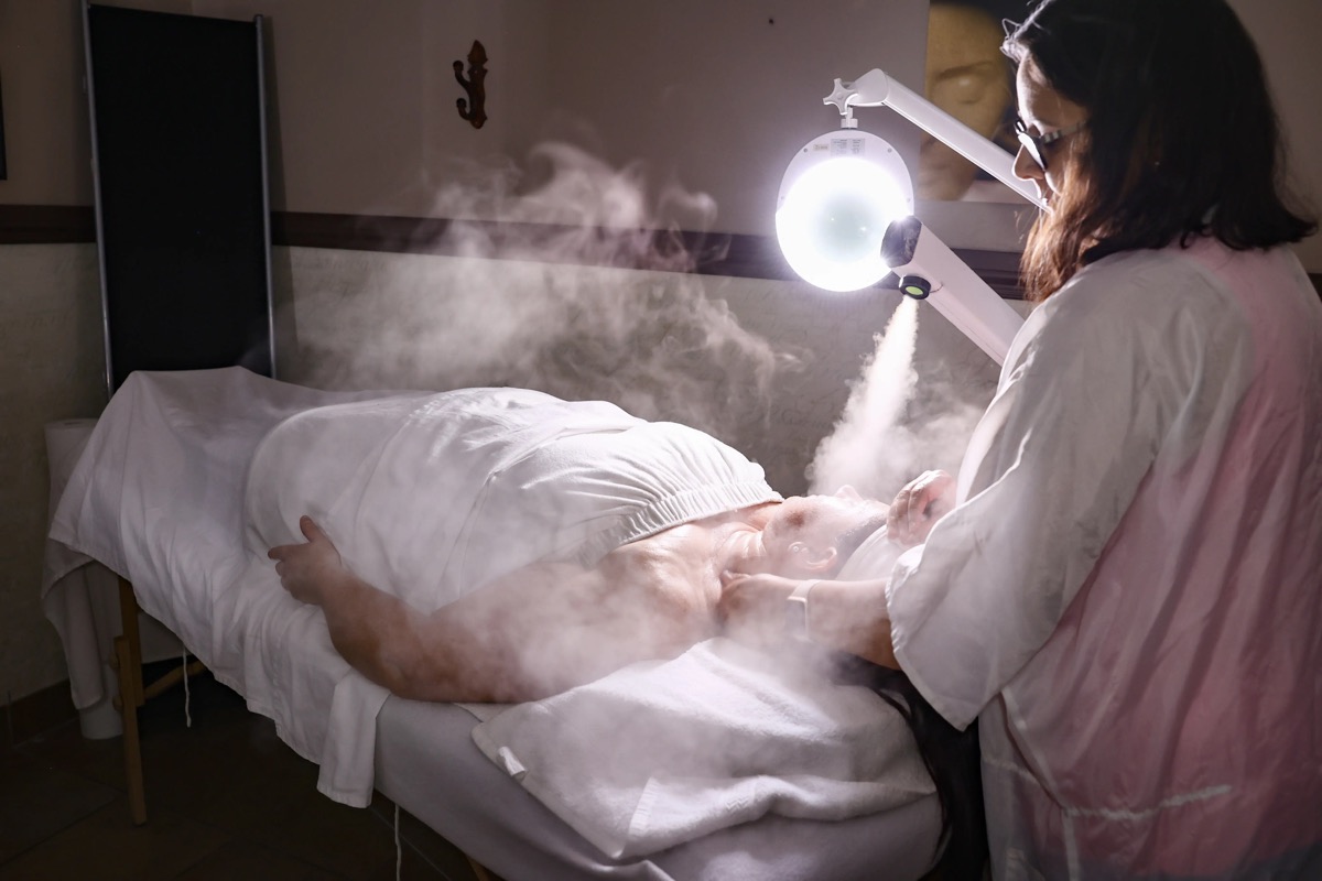 Detailed skincare application during a facial